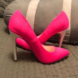 Neon pink pumps